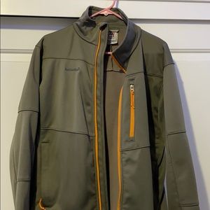 Olive green jacket with orange accents